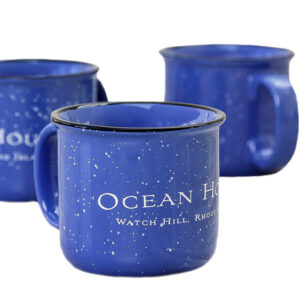 Ocean House logo mug in blue with white speckles and a black rim.