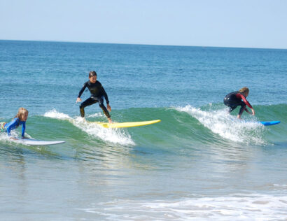 Surfers riding waves.