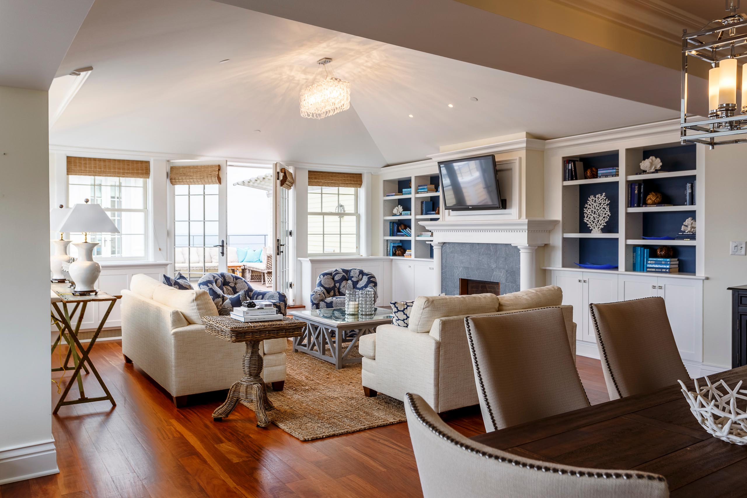 Carousel Suite living room with doors leading to a veranda.