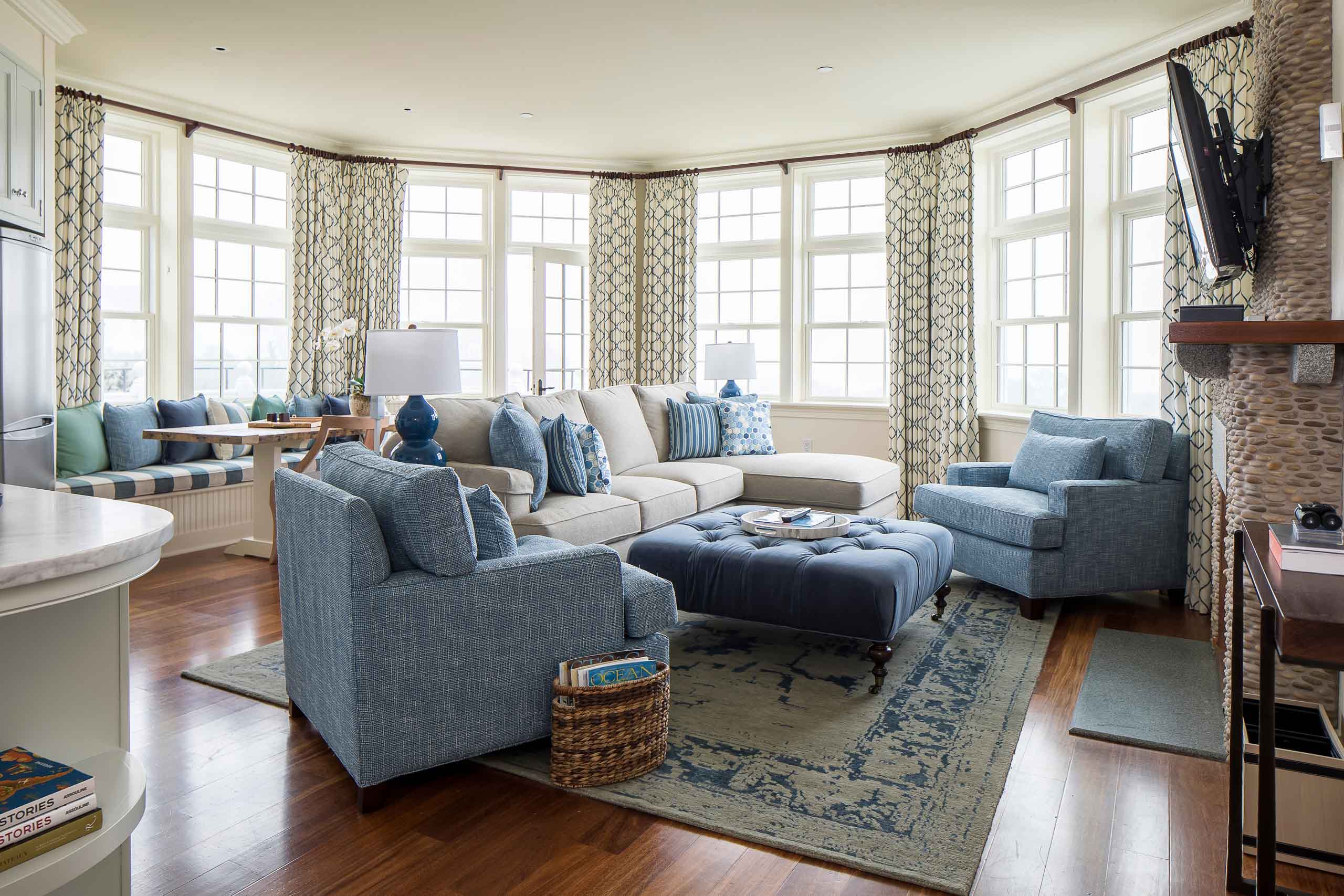 East Beach Suite living room with blue couches.