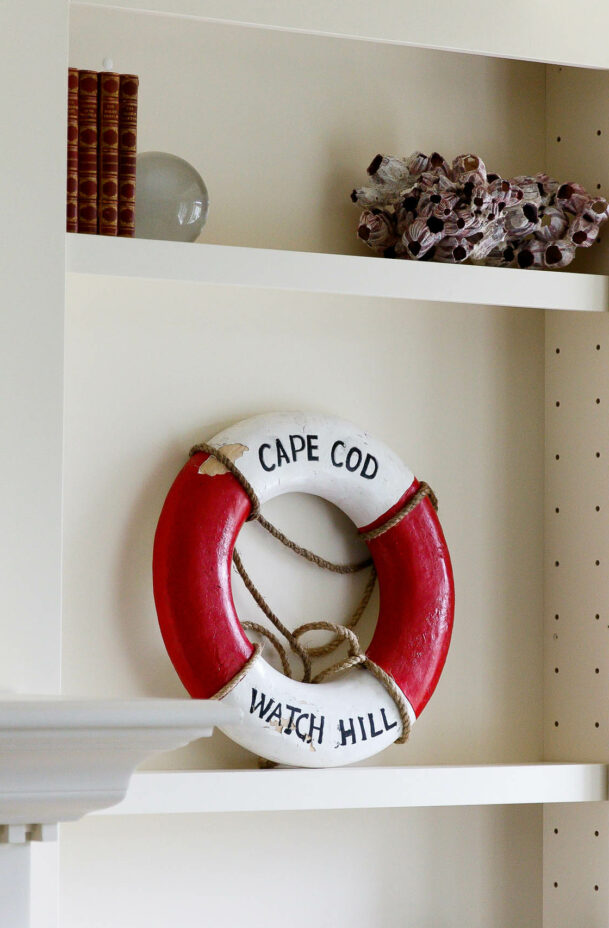 Red and white safety tube displayed on a shelf in the Hydrangea Suite.