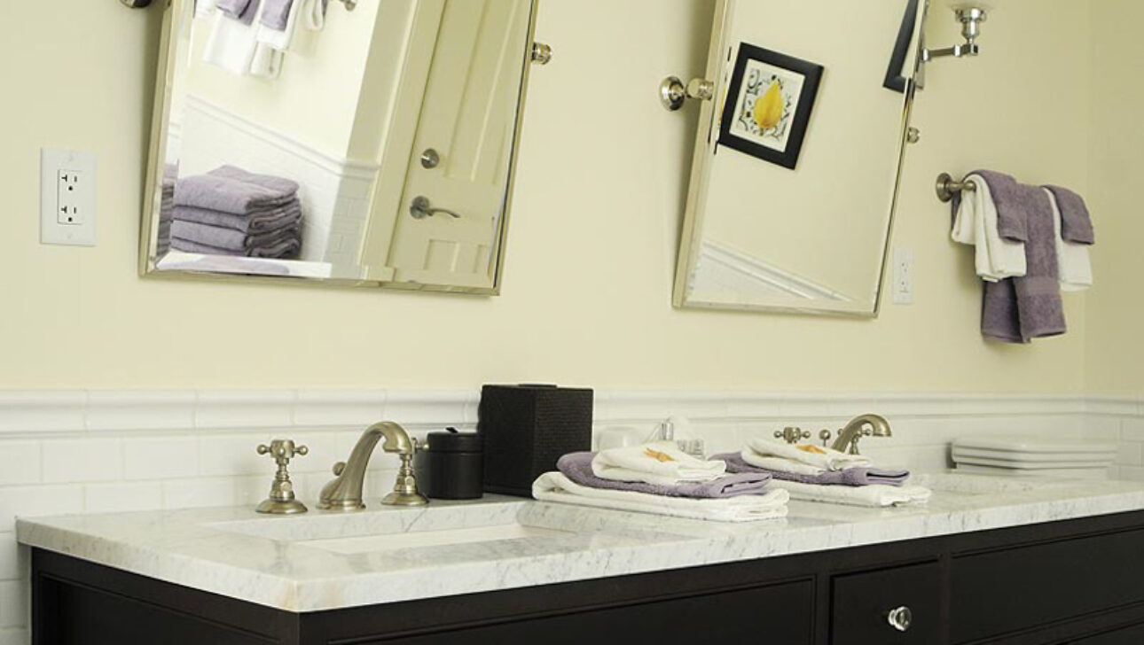 Lighthouse Suite bathroom with two sinks.