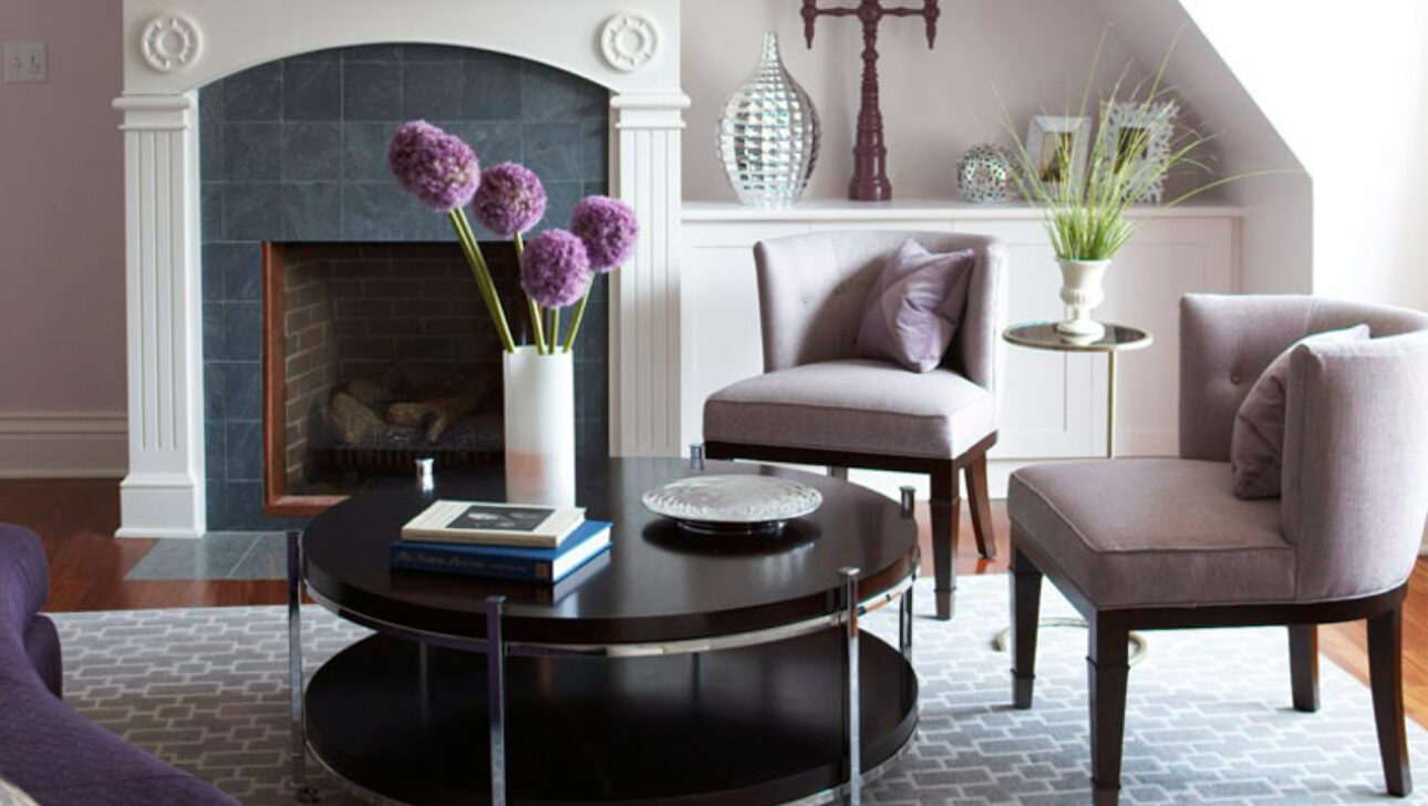 Lighthouse Suite living room with a round coffee table.