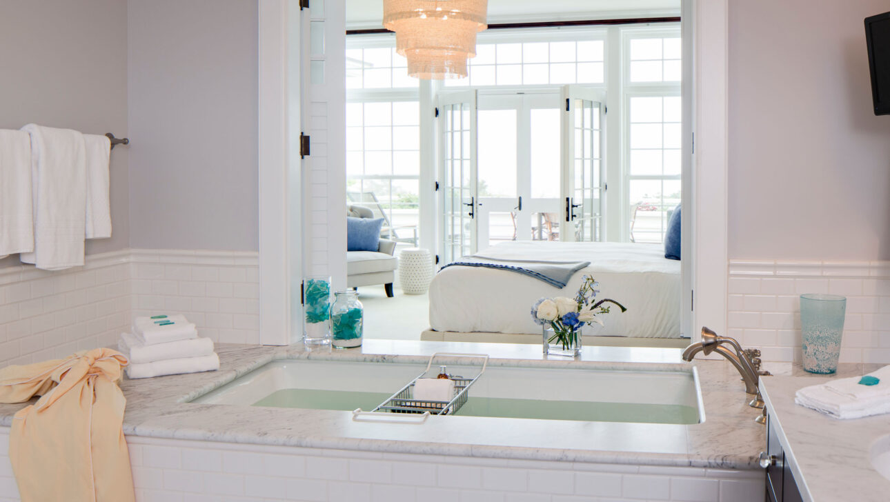 Sea Glass Suite bathroom with a bath tub.
