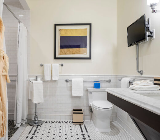 Standard guest room bathroom.