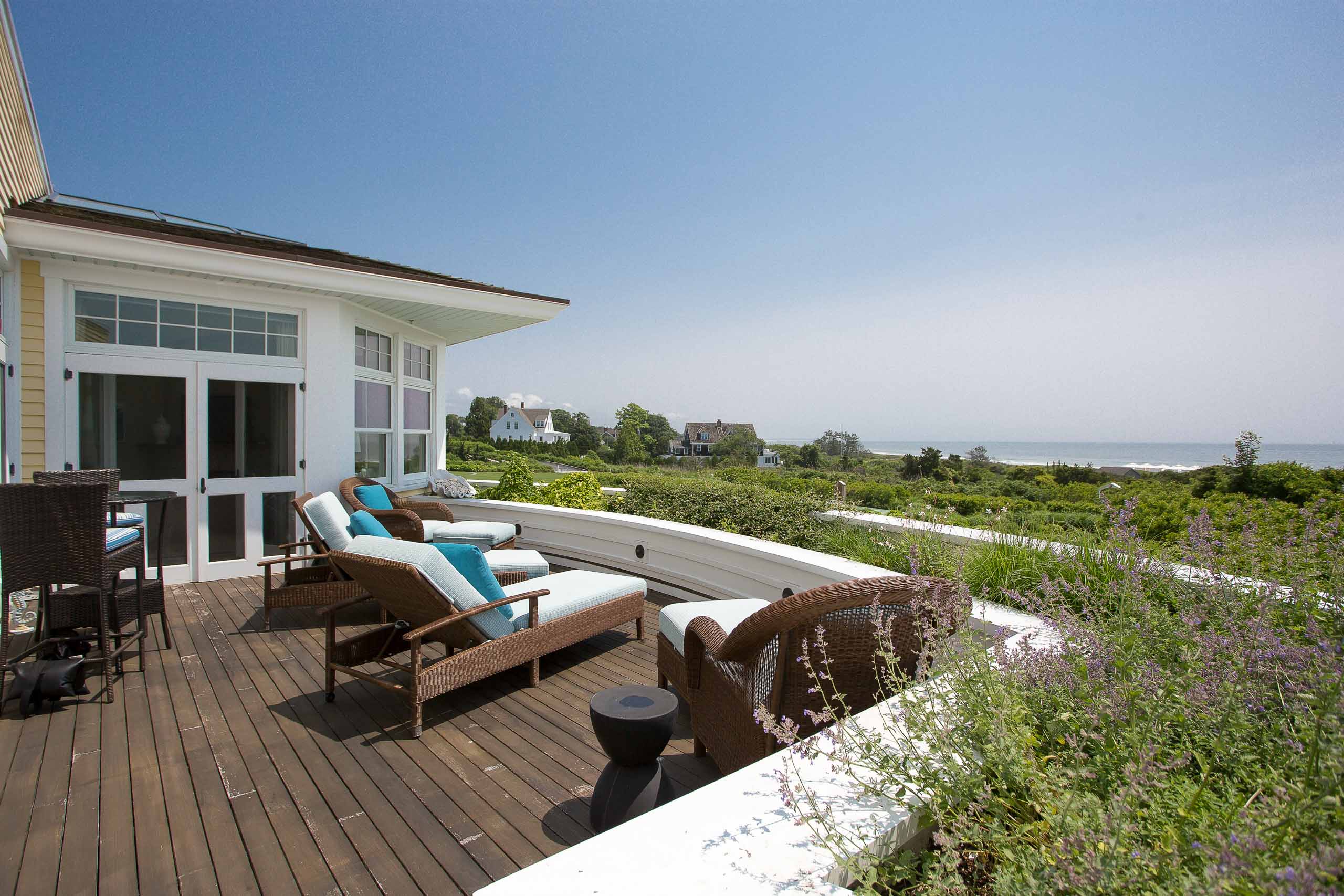 Beach Stone Suite veranda with lounge chairs.