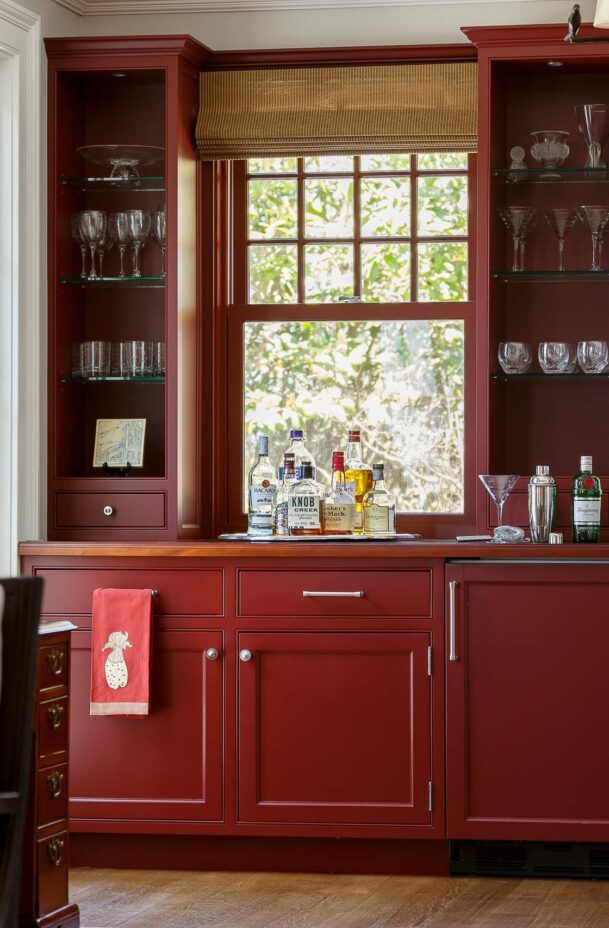 Cabinets with drinks and glasses.