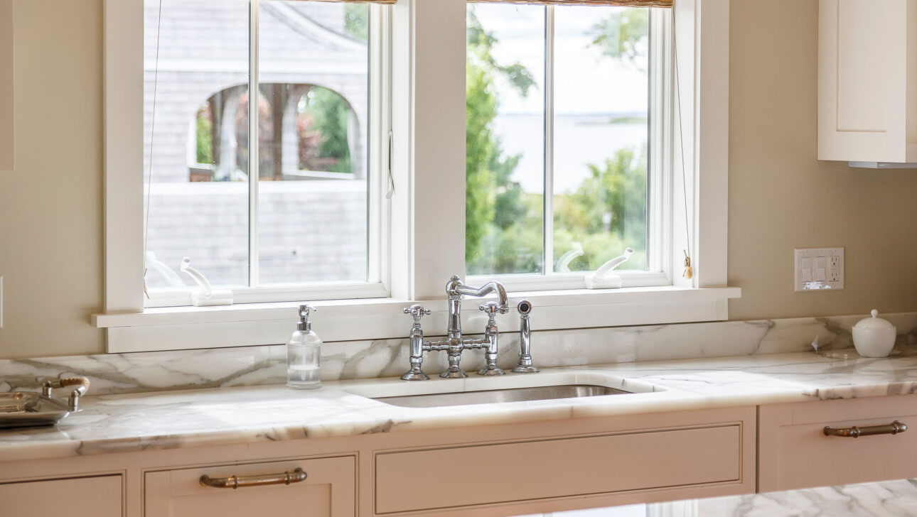 Sunset Cove kitchen sink in front of a window.