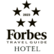 Forbes Travel Guide 2023 Hotel logo with five stars.